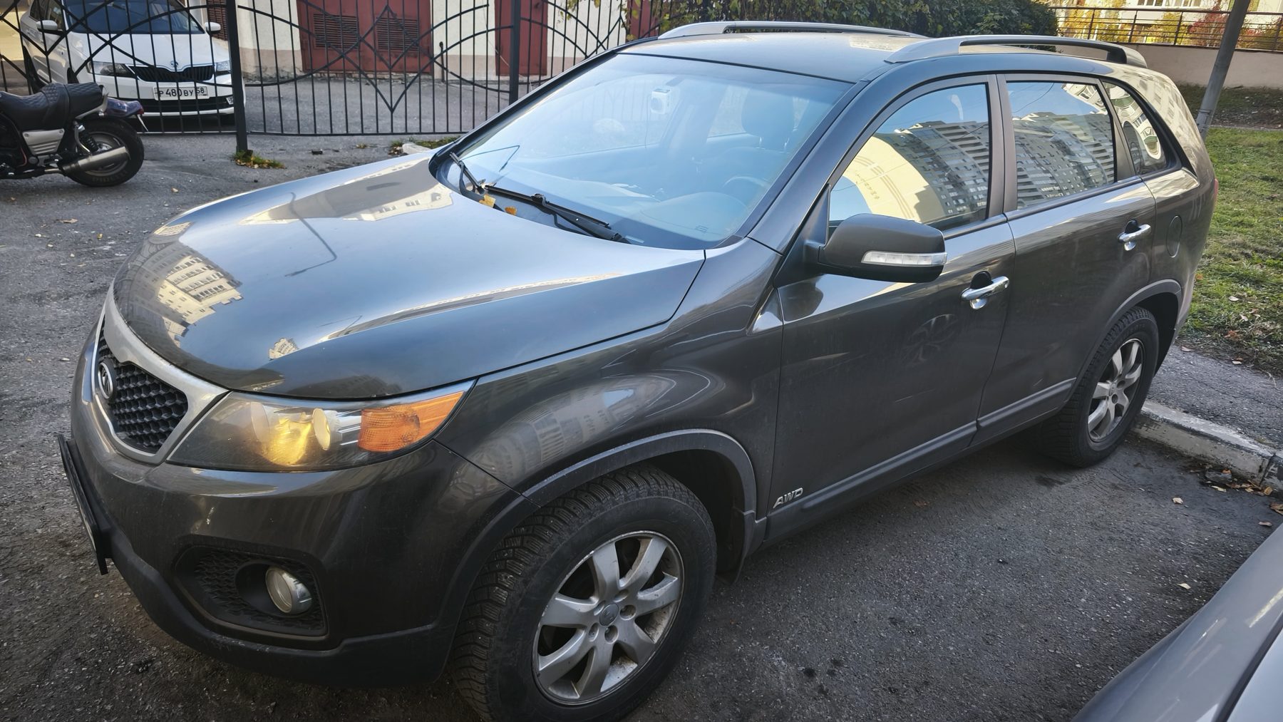 Kia Sorento XM тёмно-бронзового цвета